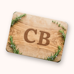 The Cutting Board app icon: a wooden board engraved with CB